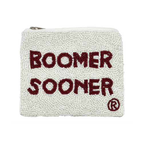 Elevate your clear bag status and show off your SOONERS spirit when accessorizing your Game Day look with our uniquely beaded Boomer Sooner zip coin bag.  Featuring a secure zip closure that keeps your cash, credit cards, lipstick, keys + more safe at the game!