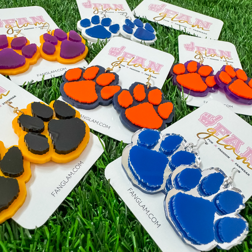 PAWsome in every way, our new dual colored PAW acrylic dangles are PAWfectly sporty + chic!
