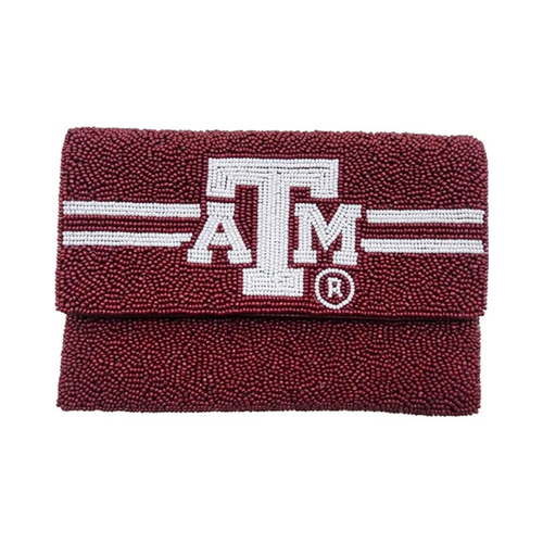 Gig'em Aggies!  It's GameDay in Aggieland and there's no better time to elevate your tailgate glam by accessorizing your Game Day outfit with our new uniquely beaded TAMU beaded mini clutch.  Stadium sized approved! Our Mini clutch features a secure snap closure that keeps your cash, credit cards, lipstick, keys + more safe at the game! 