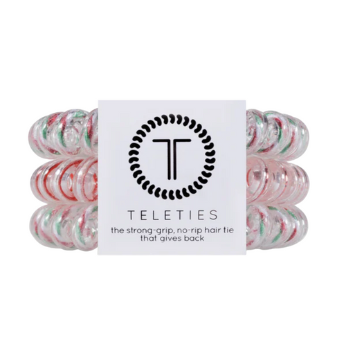 TELETIES - TINSELTOWN  Hold your hair and enhance your holiday style with TELETIES. The strong grip, no rip hair tie that doubles as a bracelet. Strong, pretty and stylish, TELETIES are designed to withstand everyday demands while taking your look to the next level.