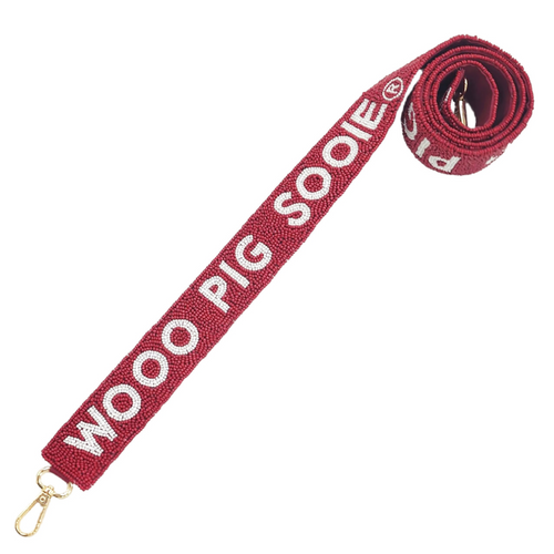 Time to call the hogs, WOOO Pig Sooie it's Game Day!!   There's no better time to elevate your clear bag status and show off your Razerback spirit by accessorizing your Game Day look with our beaded Wooo Pig Sooie bag strap.  Featuring a secure classic gold clasp closure.