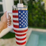 Nothing says Red White and Blue more than our American Flag Blinged Out Crystal Rhinestone Tumbler.  This stylish accessory is the perfect addition to your festive holiday get togethers and summer BBQ's! &nbsp;This Summer, sip in style every day all day and stay refreshed and hydrated all while being GLAM!