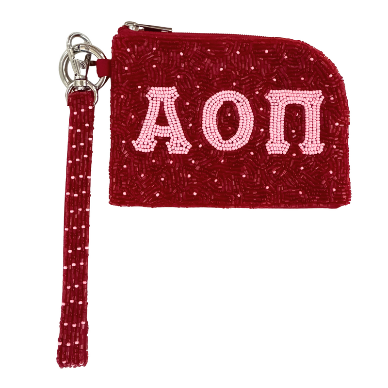 Show your sisterhood spirit in style with our exclusiveAlpha Omicron Pi Beaded Bracelet Bag! Designed to be worn on your wrist or clipped to your favorite bag, this lightweight and eye-catching accessory is perfect for any greek event! From Bid Day to Big/Little reveal, it's the perfect way to show off your letters with pride!