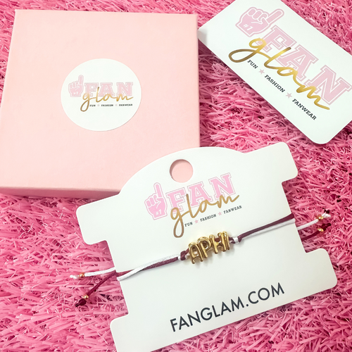 Our new cinch tie bracelets are the perfect pop of Greek glam — stackable, adjustable, and so on trend! Whether you are spoiling your Little, surprising your Big, or celebrating Bid Day, our gold letter greek bracelet adds just the right sparkle to every sorority moment.

With its comfy fit and meaningful charm, it's the go-to gift for your Greek fam — because sisterhood looks good on you!