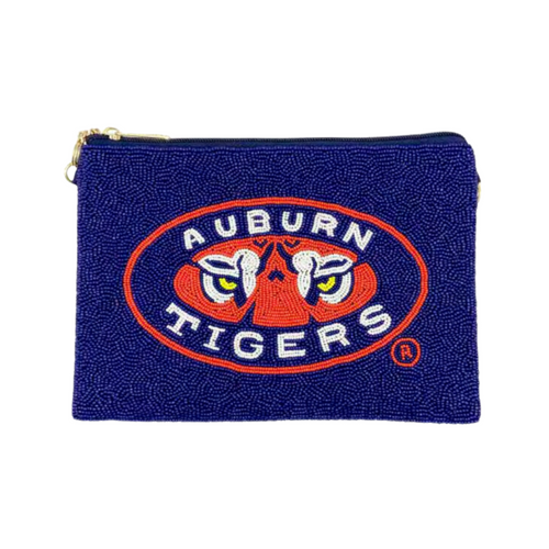 Get ready to stand up and yell, Hey War Eagle! Be GLAM in the stands as you cheer on your Tigers and elevate your Game Day fit with our uniquely beaded Auburn Tigers wristlet.