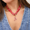 Celebrate your Bama pride with this chic Alabama Crimson Tide bandana scarf necklace. Playful and polished, it adds a preppy touch to any game day outfit, making you stand out while supporting your team in style. Lightweight and easy to wear, it’s the perfect accessory for every Crimson Tide fan.