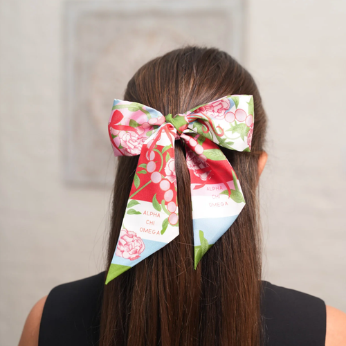 Show off your Alpha Chi Omega pride with this playful silk scarflette! With cheeky winks to lyres and pearls, this sassy accessory jazzes up any look while keeping your sorority spirit alive. Slip it on and transform even the most boring outfit into a fun fashion statement that screams "sisterhood with style!"