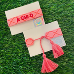 Show off your sorority colors in style with our officially licensed custom Sorority Tassel Bracelets. &nbsp; A portion of the proceeds from the sale of this bracelet with go directly to Alpha Chi Omega.&nbsp;