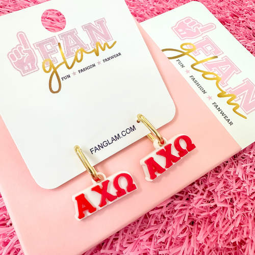 Wear your letters. Live your legacy. Love your style.

Add a little charm to your everyday look with our Alpha Chi Omega Charmed Life Huggies! Featuring your Greek Letters in a bold yet dainty way, these lightweight huggie hoops are perfect for every moment, and made to celebrate your chapter all semester long.