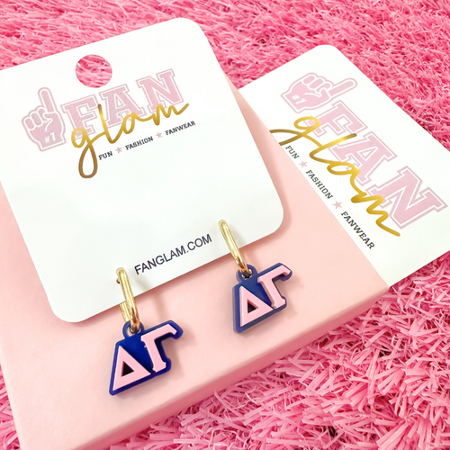 Wear your letters. Live your legacy. Love your style.

Add a little charm to your everyday look with our Delta Gamma Charmed Life Huggies! Featuring your Greek Letters in a bold yet dainty way, these lightweight huggie hoops are perfect for every moment, and made to celebrate your chapter all semester long.