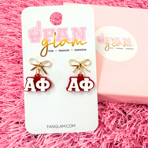 Add a little glam to your Greek life with our Gold Bow Chapter Charms! These sweet drop earrings feature a dainty metallic bow paired with bold, bubbly sorority letters—perfect for Bid Day, Big/Little reveals, or just repping your chapter with style.
