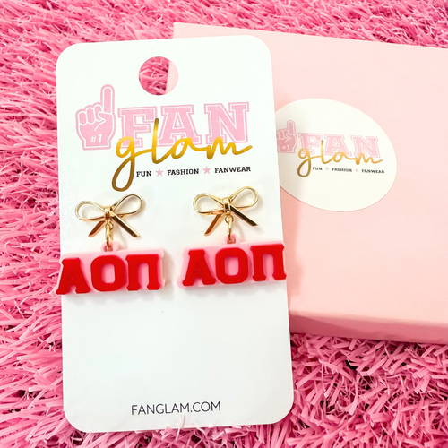 Add a little glam to your Greek life with our Gold Bow Chapter Charms! These sweet drop earrings feature a dainty metallic bow paired with bold, bubbly sorority letters—perfect for Bid Day, Big/Little reveals, or just repping your chapter with style.