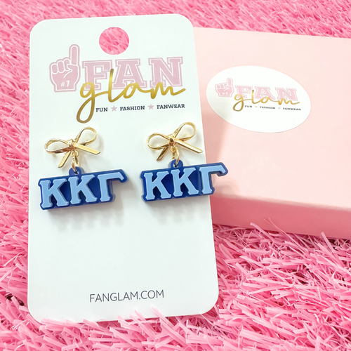 Add a little glam to your Greek life with our Gold Bow Chapter Charms! These sweet drop earrings feature a dainty metallic bow paired with bold, bubbly sorority letters—perfect for Bid Day, Big/Little reveals, or just repping your chapter with style.