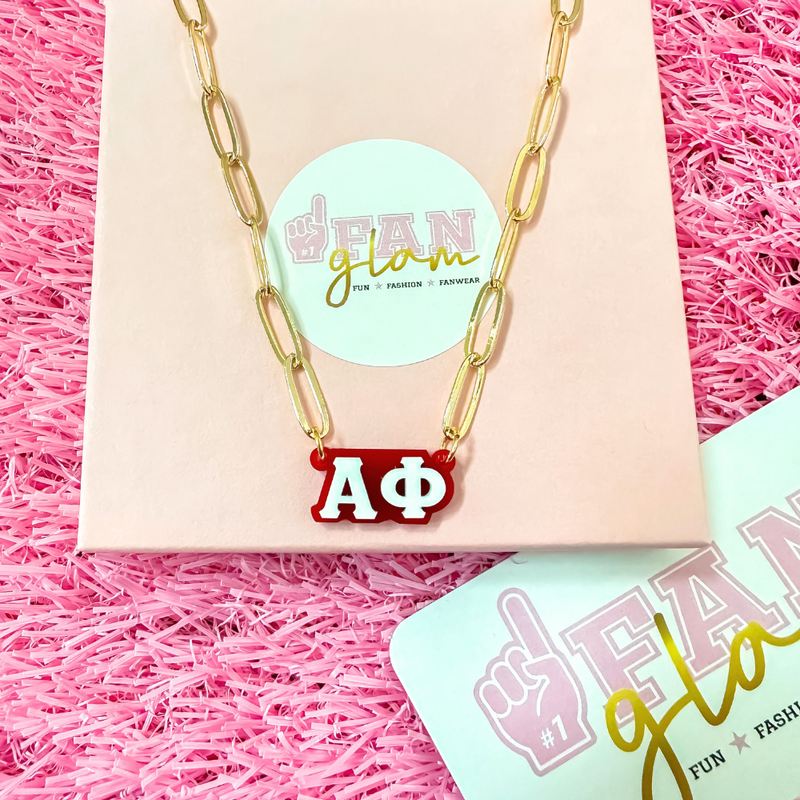 Wear your letters. Live your legacy. Love your style.

Add a little charm to your everyday look with our Alpha Phi Charmed Life Necklace! Featuring your Greek letters in a bold yet delicate design, this lightweight necklace is perfect for layering or wearing solo. It's the perfect touch of sparkle to celebrate your chapter all semester long!