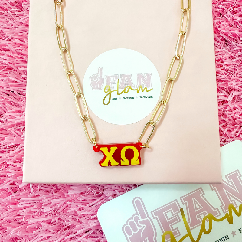 Wear your letters. Live your legacy. Love your style.

Add a little charm to your everyday look with our Chi Omega Charmed Life Necklace! Featuring your Greek letters in a bold yet delicate design, this lightweight necklace is perfect for layering or wearing solo. It's the perfect touch of sparkle to celebrate your chapter all semester long!