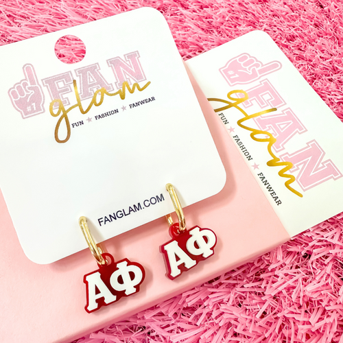Wear your letters. Live your legacy. Love your style.

Add a little charm to your everyday look with our Alpha Phi Charmed Life Huggies! Featuring your Greek Letters in a bold yet dainty way, these lightweight huggie hoops are perfect for every moment, and made to celebrate your chapter all semester long.