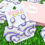 Show off your Wildcat spirit with a twist of style! Our exclusive Kansas State Wildcats Beaded Dangle Earrings are perfect for game day or any day. Add a playful pop of team pride to your outfit!