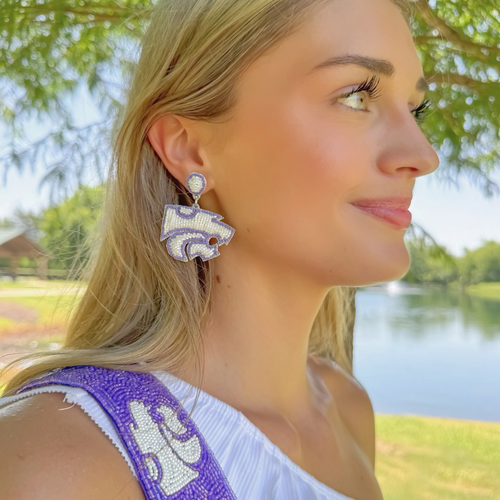 Show off your Wildcat spirit with a twist of style! Our exclusive Kansas State Wildcats Beaded Dangle Earrings are perfect for game day or any day. Add a playful pop of team pride to your outfit!