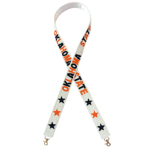 Let's Go Pokes!&nbsp; It's game time&nbsp;in&nbsp;Stilly&nbsp;and we're here to help&nbsp;elevate your Game Day GLAM! &nbsp;Cheer your Cowboys on in style, by accessorizing&nbsp;your clear bag&nbsp;with our new Go Pokes beaded bag strap.

Featuring a&nbsp;secure classic gold clasp closure.