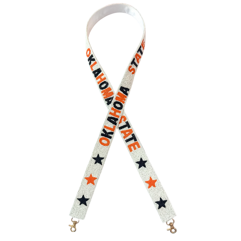 Let's Go Pokes!&nbsp; It's game time&nbsp;in&nbsp;Stilly&nbsp;and we're here to help&nbsp;elevate your Game Day GLAM! &nbsp;Cheer your Cowboys on in style, by accessorizing&nbsp;your clear bag&nbsp;with our new Go Pokes beaded bag strap.

Featuring a&nbsp;secure classic gold clasp closure.