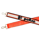 Let's Go Pokes!&nbsp; It's game time&nbsp;in&nbsp;Stilly&nbsp;and we're here to help&nbsp;elevate your Game Day GLAM! &nbsp;Cheer your Cowboys on in style, by accessorizing&nbsp;your clear bag&nbsp;with our new Go Pokes beaded bag strap.

Featuring a&nbsp;secure classic gold clasp closure.
