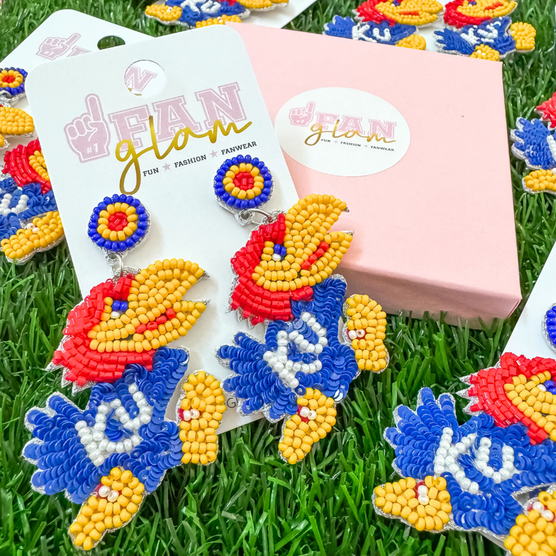 Show off your Wildcat spirit with a twist of style! Our exclusive Kansas Jayhawks Beaded Dangle Earrings are perfect for game day or any day. Add a playful pop of team pride to your outfit!