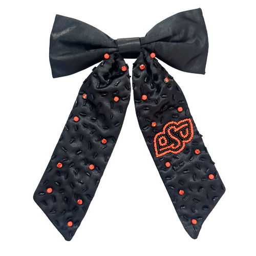 Add a splash of school spirit with our Logo Game Day Hair Bow. This fun accessory is bold and colorful, perfect for repping your school spirit in style. Whether for game day or everyday fun, this versatile hair bow brings a spirited touch to your collection.