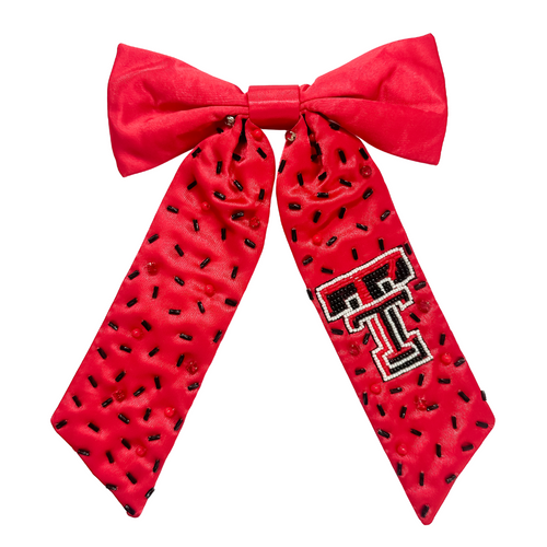 Add a splash of school spirit with our Logo Game Day Hair Bow. This fun accessory is bold and colorful, perfect for repping your school spirit in style. Whether for game day or everyday fun, this versatile hair bow brings a spirited touch to your collection.