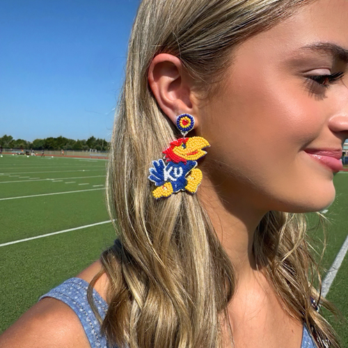 Show off your Wildcat spirit with a twist of style! Our exclusive Kansas Jayhawks Beaded Dangle Earrings are perfect for game day or any day. Add a playful pop of team pride to your outfit!