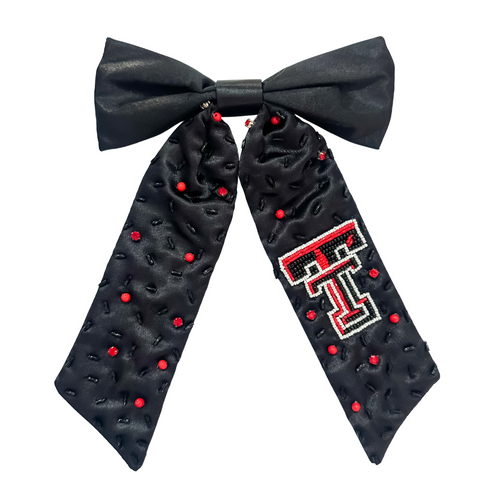 Add a splash of school spirit with our Logo Game Day Hair Bow. This fun accessory is bold and colorful, perfect for repping your school spirit in style. Whether for game day or everyday fun, this versatile hair bow brings a spirited touch to your collection.