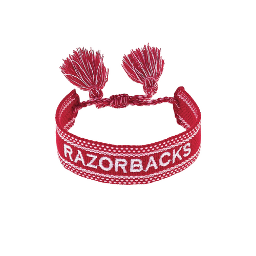 Show off your Razorbacks pride with this playful woven tassel bracelet. Lightweight and vibrant, it adds a splash of fun to any game day outfit while keeping your team spirit shining bright. Perfect for stacking or wearing solo, it’s your new lucky charm for every win!