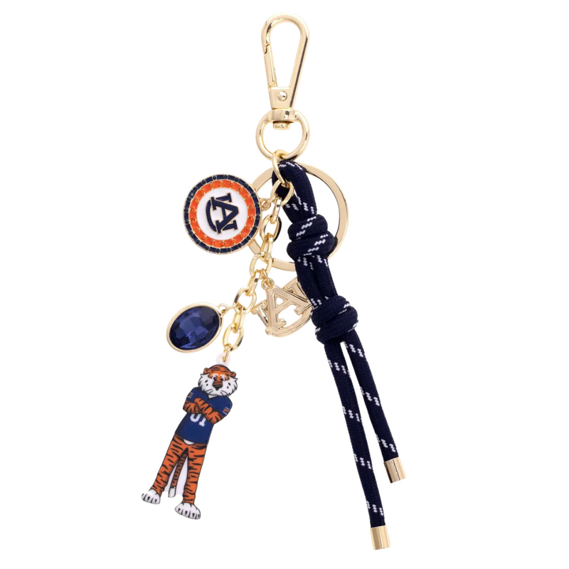 Show off your Auburn Tigers pride with this fun and fierce cluster bag charm. Perfect for die-hard fans, it adds a playful pop of navy and orange to your favorite bag or backpack. Let your team spirit shine wherever you go!