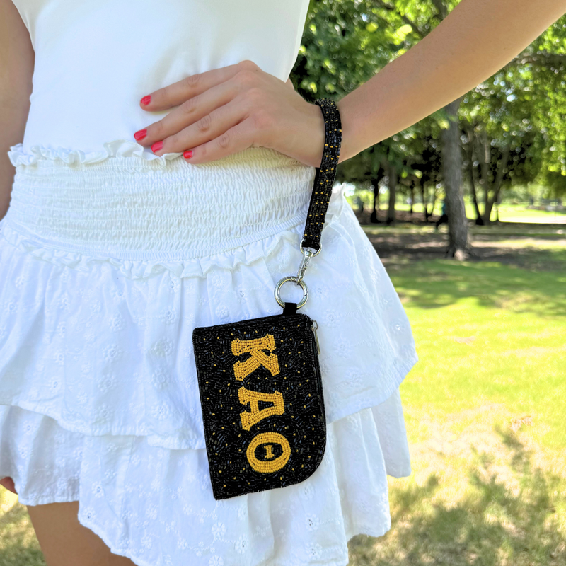 Show your sisterhood spirit in style with our exclusive Kappa Alpha Theta Beaded Bracelet Bag! Designed to be worn on your wrist or clipped to your favorite bag, this lightweight and eye-catching accessory is perfect for any greek event! From Bid Day to Big/Little reveal, it's the perfect way to show off your letters with pride!