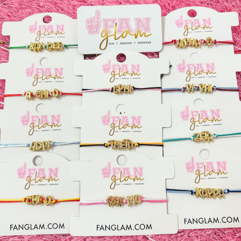 Welcome to sisterhood in style! Our Sorority Starter Glam Box is the perfect way to celebrate Bid Day or even Big/Little reveals!

Inside each Glam Box you’ll find a Sequin Greek Letter Wristlet/Keychain and a Gold Balloon Cinch Tie Bracelet &nbsp;accompanied with a personalized note where you can leave a custom message for your favorite sorority girl!

Whether you're new to Greek life or gifting your Little, this box is packed with spirit, sparkle, and sisterhood.&nbsp;