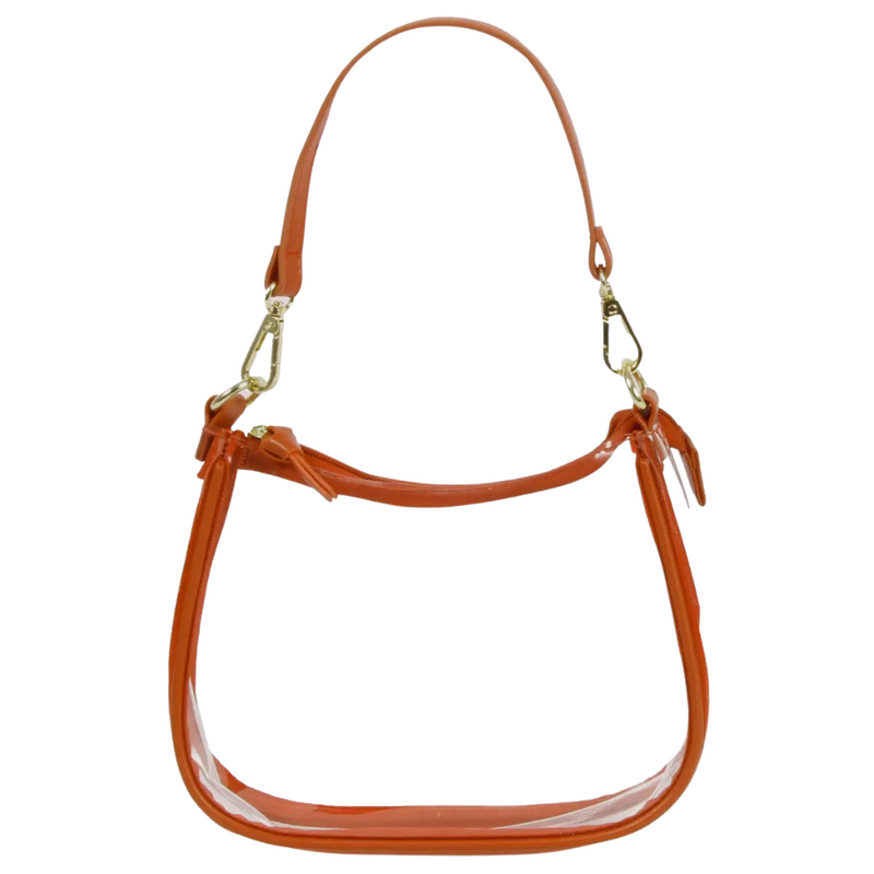 Our new Clara Clear Bag perfectly blends function and fashion, meeting stadium regulations with a chic design. It features a durable PVC body, secure zipper closure, and two interchangeable straps, keeping your essentials stylish and secure on game day.&nbsp;