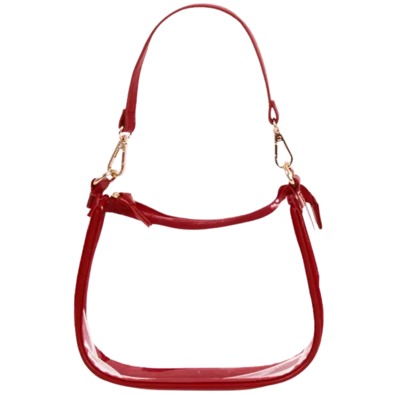 Our new Clara Clear Bag perfectly blends function and fashion, meeting stadium regulations with a chic design. It features a durable PVC body, secure zipper closure, and two interchangeable straps, keeping your essentials stylish and secure on game day.&nbsp;
