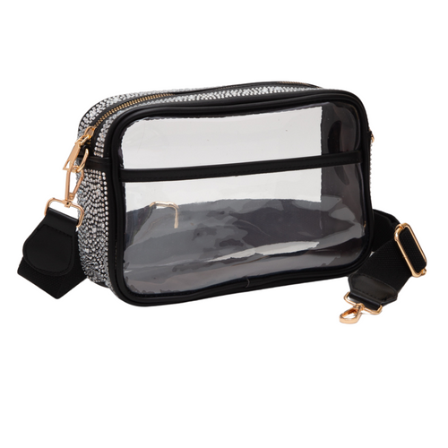 Glitter and Shine on the sidelines when styling your Game Day look with our NEW Rhinestone Clear Crossbody Zip Top Bag! &nbsp;

Featuring a clear PVC body adorned with rhinestones and gold metal accents.&nbsp; Comfortable and roomy, this bag is perfect for the Game Day girl who likes to come prepared!