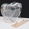 Fall in love with our newest GameDay stadium approved crossbody heart shaped bag.&nbsp;  Featuring a clear PVC body with a classic gold chain that can be easily removed to incorporate all your favorite team colored bag straps.