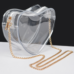 Fall in love with our newest GameDay stadium approved crossbody heart shaped bag.&nbsp;  Featuring a clear PVC body with a classic gold chain that can be easily removed to incorporate all your favorite team colored bag straps.