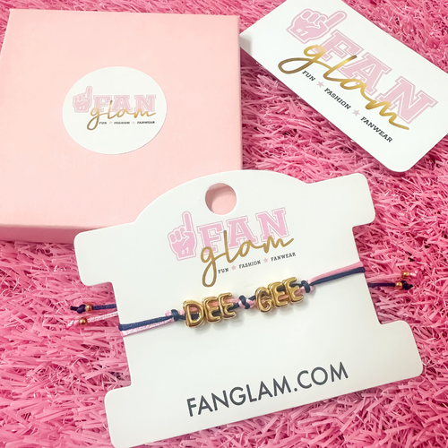 Our new cinch tie bracelets are the perfect pop of Greek glam — stackable, adjustable, and so on trend! Whether you are spoiling your Little, surprising your Big, or celebrating Bid Day, our gold letter greek bracelet adds just the right sparkle to every sorority moment.

With its comfy fit and meaningful charm, it's the go-to gift for your Greek fam — because sisterhood looks good on you!