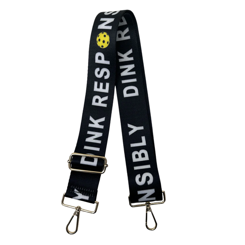 Show off your pickleball humor with our "Dink Responsibly" Interchangeable Printed Bag Strap! Perfect for players who know when to dink and when to slam. Swap this cheeky strap onto any bag for a playful reminder that with great dinking comes great responsibility. Your pickleball gear just got a whole lot more fun!