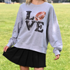 Glitter &amp; Shine On The Sidelines When Wearing Our new GameDay Football Love Sequin long sleeve pullover.&nbsp; A perfect light layer for chilly gamedays and a great pairing with black leggings or your favorite pair of jeans.&nbsp;