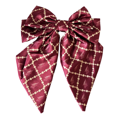 Add a splash of collegiate charm with our Satin Game Day Hair Bow. This playful accessory features a vibrant pattern that’s perfect for showing off your school pride. Whether for game day or everyday fun, this versatile hair bow brings a spirited touch to your collection.