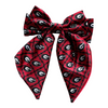 Add a splash of collegiate charm with our Satin Game Day Hair Bow. This playful accessory features a vibrant pattern that’s perfect for showing off your school pride. Whether for game day or everyday fun, this versatile hair bow brings a spirited touch to your collection.