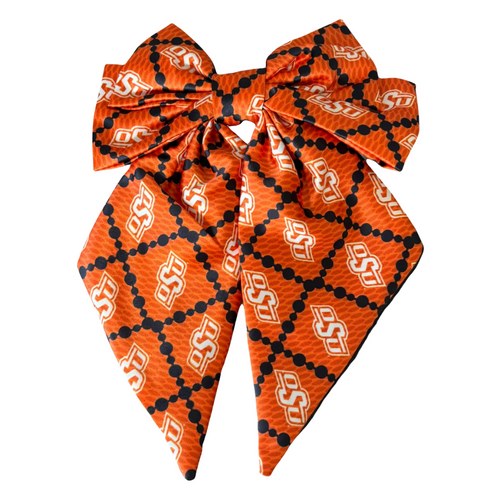 Add a splash of collegiate charm with our Satin Game Day Hair Bow. This playful accessory features a vibrant pattern that’s perfect for showing off your school pride. Whether for game day or everyday fun, this versatile hair bow brings a spirited touch to your Gators collection.