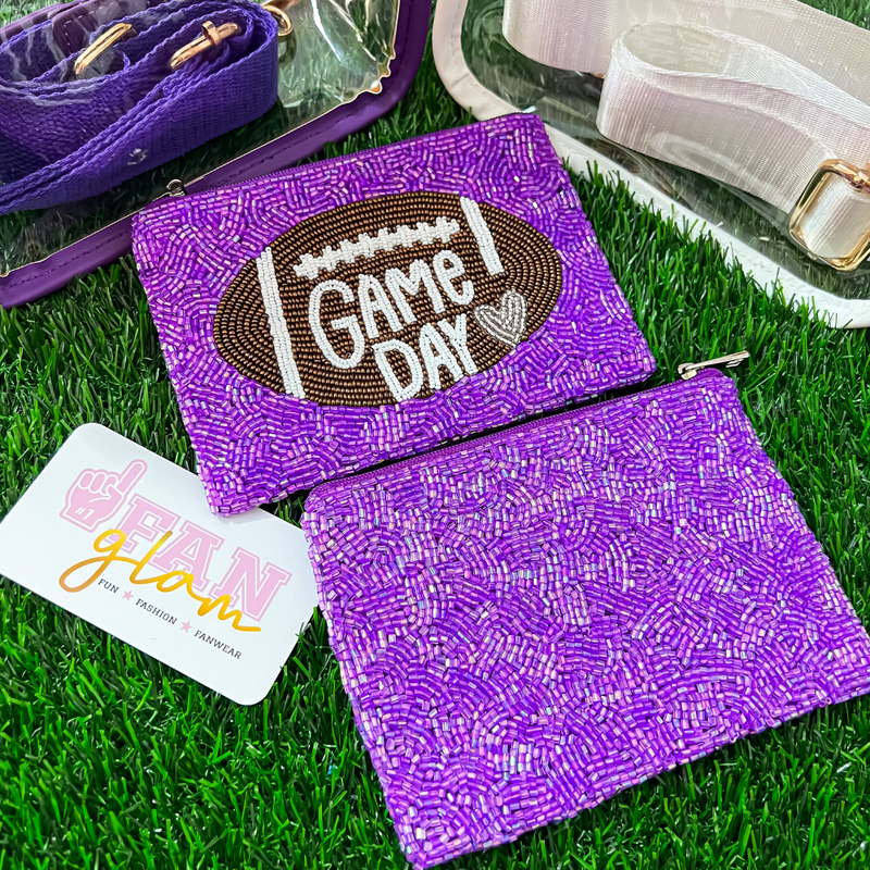 Elevate your clear bag status and show your love for the game with our exclusive Game Day double sided beaded zip coin bag.  A perfect sized team colored pouch to securely hold your cash, credit cards lipstick and keys!