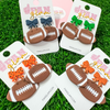 Bow Vibes + Friday Night Lights!!&nbsp; Our GameDay Tam Clay Co Bow Football Dangles feature all your favorite team colors!&nbsp; &nbsp;And it's the perfect way to add a pop of color to your gameday attire.  Be the talk of the stands when you arrive wearing these stunning, one-of-a-kind pieces of Glam ear art!