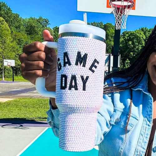Sip in style on game day + every day!&nbsp; Add a touch of GAME DAY to any outfit with our White Crystal "Blinged Out" Tumbler!  Indulge in your love for&nbsp;the game&nbsp;and show off your&nbsp;team&nbsp;spirit. These stylish accessories are the perfect addition to your game day fit.