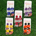 The perfect accessory to coordinate with your Friday Night Lights ensemble or Saturday tailgate style.  Elevate your Game Day look with our dual team colored Game Day Football beaded dangles! 