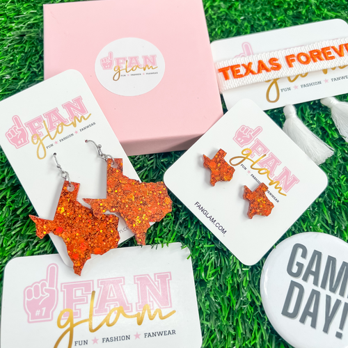 Our GameDay Glitter Glam State Of Texas earrings are the perfect pop of color + glam for game time! Show off your Texas state pride while sporting your favorite team colors.